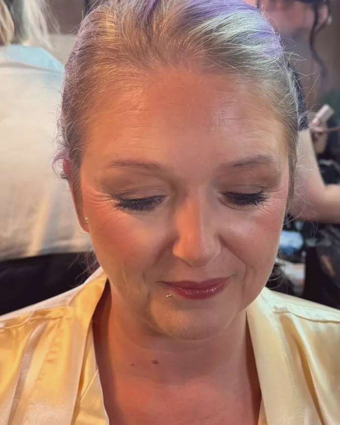 Makeup on a mature client: lifted, soft definition and a natural lip.