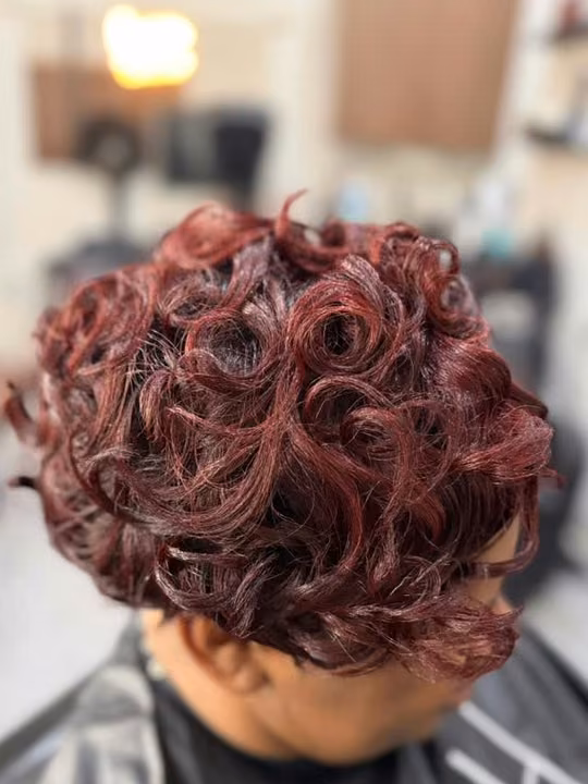 Burgundy custom-color curls from above