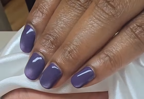 Purple cat-eye nails, hands only
