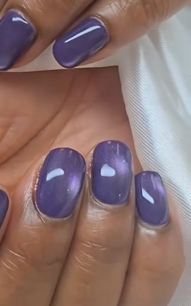 Purple cat-eye nails, hands only