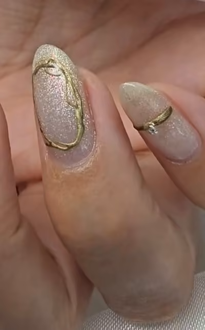 Champagne cat-eye nails, hands only