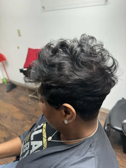 Short curled hairstyle from Hair by Kelsi’s portfolio