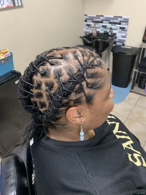 An intricate updo from Swanika’s Booksy portfolio